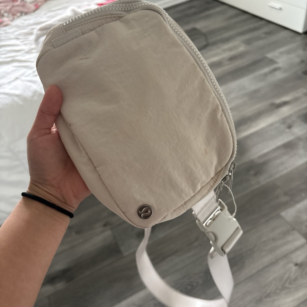 Lululemon Athletica Cream Crossbody Bag with Curved Design